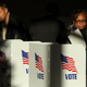 Voters cast their ballots at a polling place at Highland Colony Baptist Church, November 27, 2018 in Ridgeland, Mississippi.